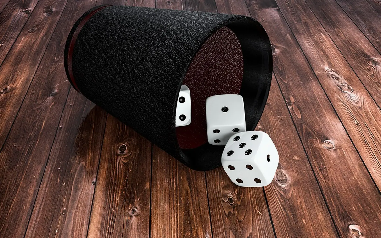 Dice, cup and game